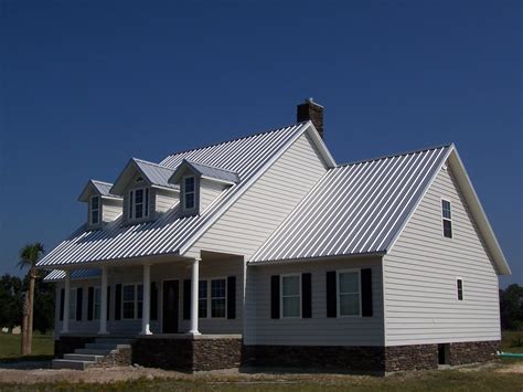 galvalume metal roof on white house|houses with white metal roofs.